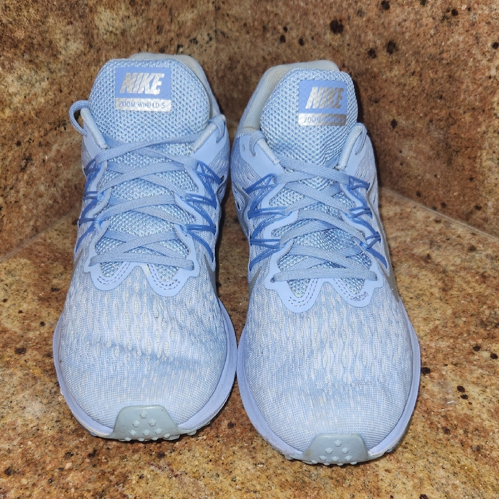 Nike Blue Athletic Shoes with Modern Knit Design